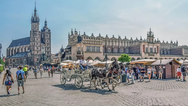 Long summer evening light on Krakow Main Square