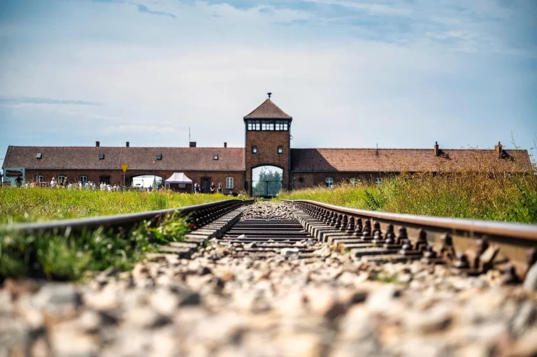Arbeit Macht Frei entrance gate at Auschwitz I, overcast morning light, no visitors