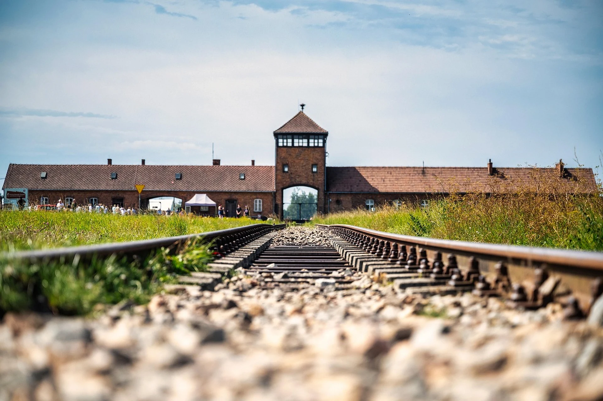 Arbeit Macht Frei entrance gate at Auschwitz I, overcast morning light, no visitors