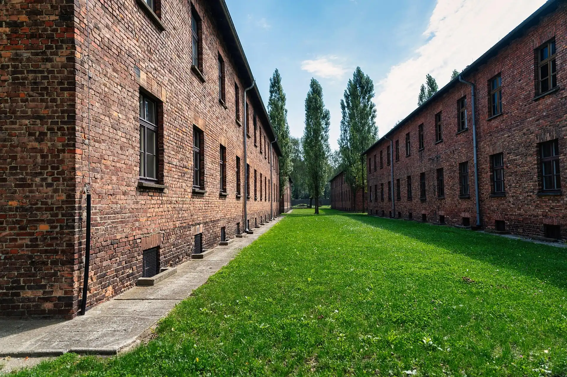 How long does a visit to auschwitz take — Red brick barrack rows at Auschwitz I, empty
