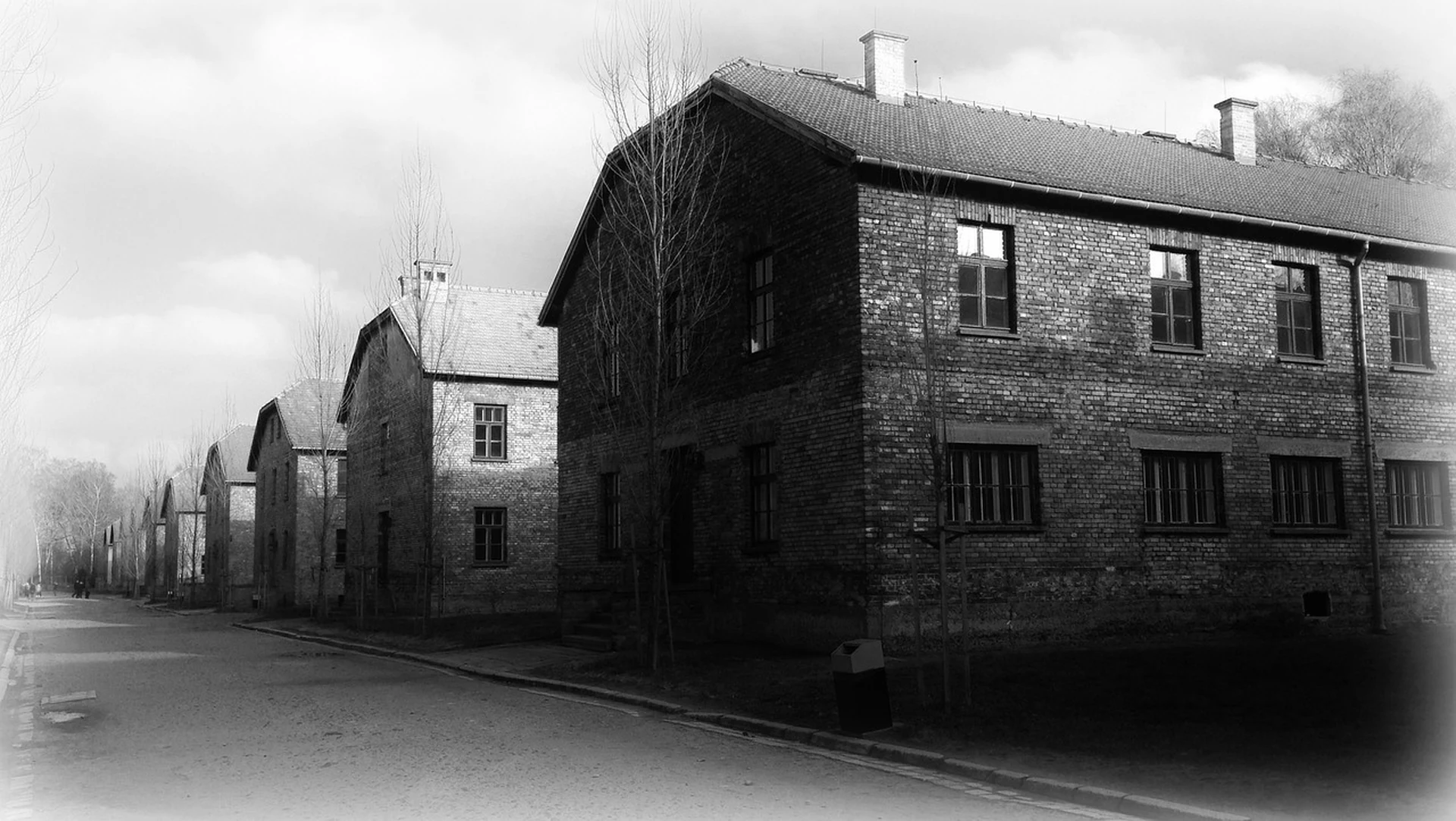 Visiting auschwitz i and birkenau — Brick building facade row and empty courtyard at Auschwitz I
