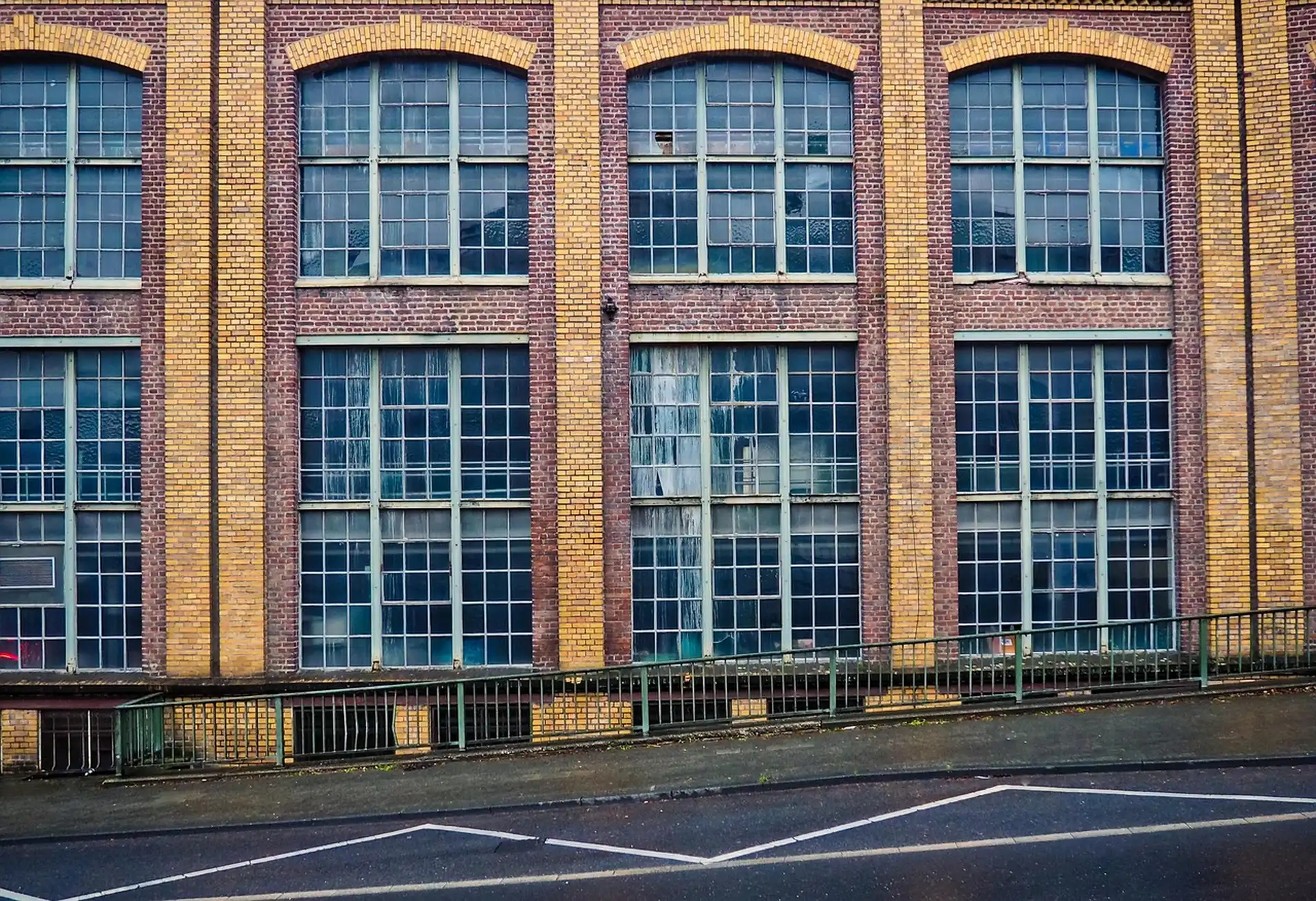 Winter light on industrial brick facade, Podgórze