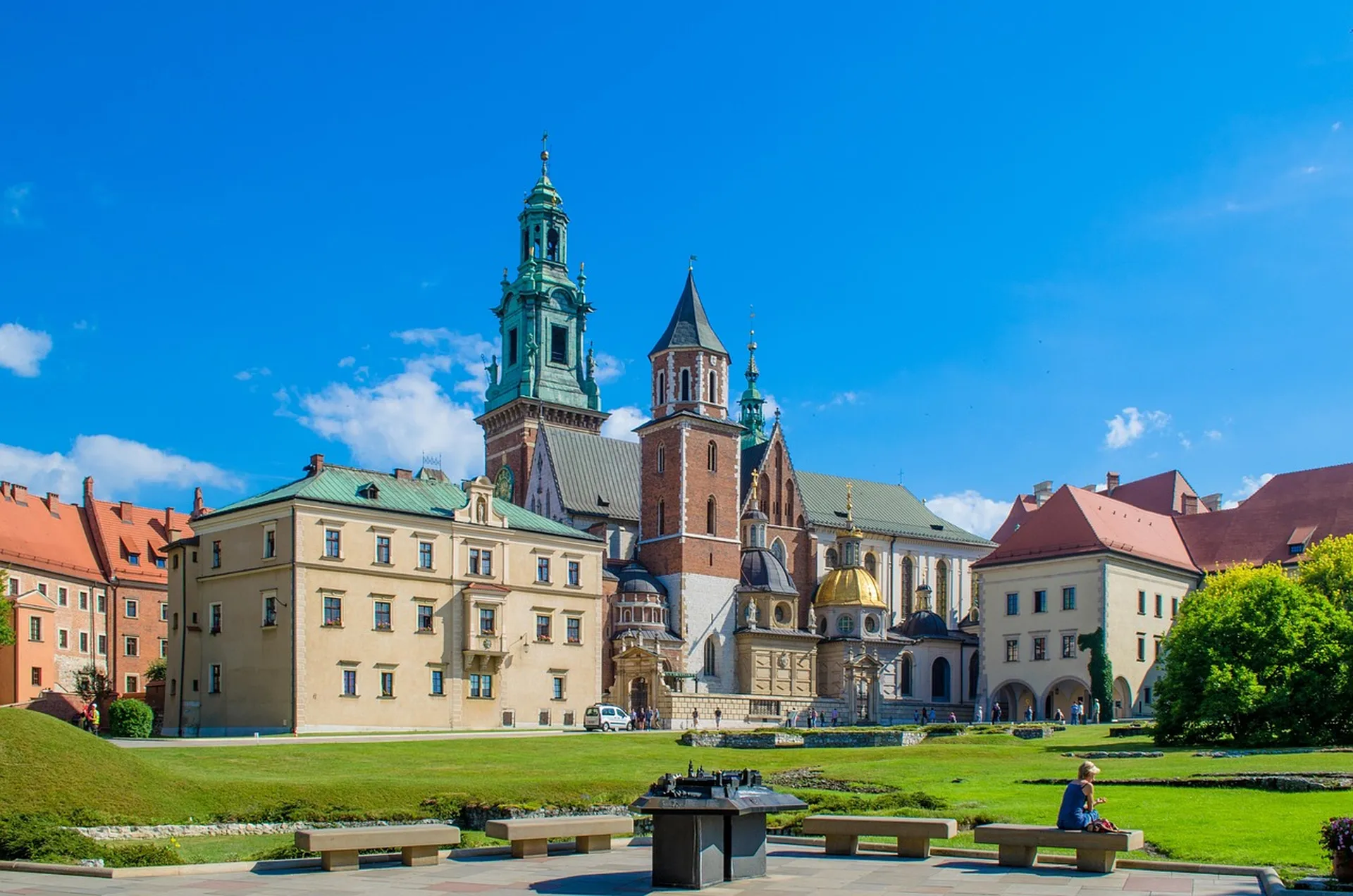 Krakow old town walking tour — Florian's Gate, empty street, morning light